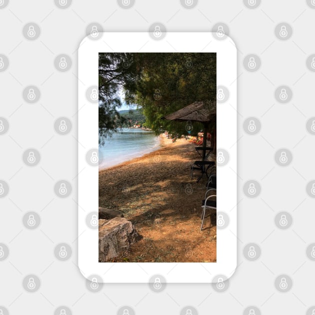 Scenic view on Mediterranean sea from beach cafe under fir trees and tiki bar Magnet by Khala