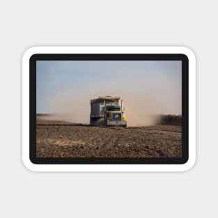 Truck in the dust. Magnet