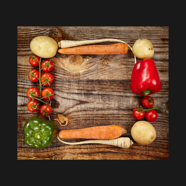 Vegetables frame on wooden board by naturalis