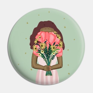 Cute girl holding a floral bouquet in a pink dress | pink and green Pin