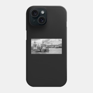 Crew transfer vessels moored up in the docks in the seaside town of Great Yarmouth, Norfolk Phone Case