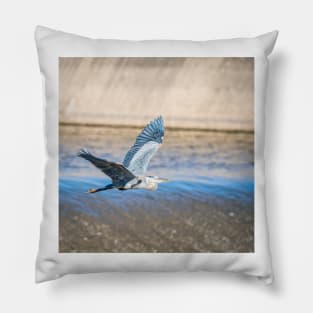 Great Blue Heron In Flight Over the Spillway by Debra Martz Pillow