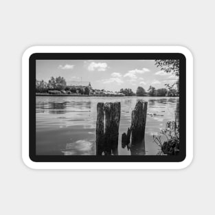 Wooden mooring posts on the River Bure, Horning, Norfolk Broads Magnet