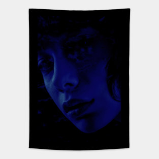 Beautiful girl face in dark blue lighting. Beautiful light tones defines shapes. Tapestry