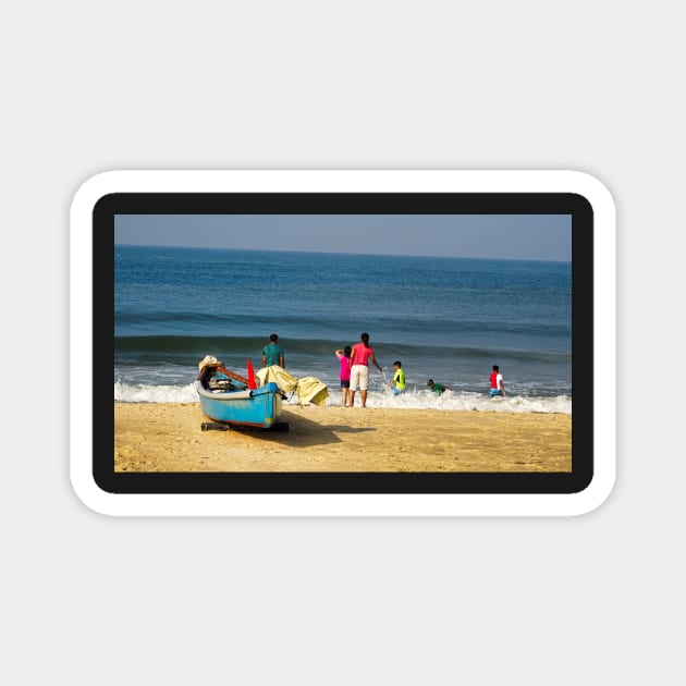 Families enjoy the time on the beach in India Magnet by fantastic-designs