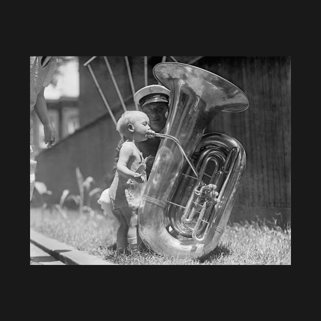 Baby Playing Tuba, 1923. Vintage Photo by historyphoto