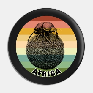 Dung Beetle on top of Dung Ball against Vintage Retro Africa Sunset Pin