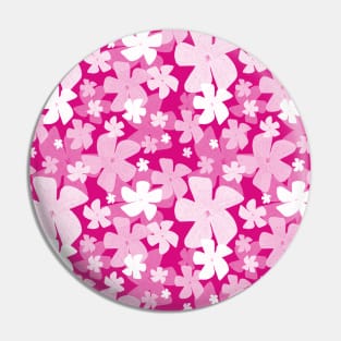 White floral pattern against pink background Pin