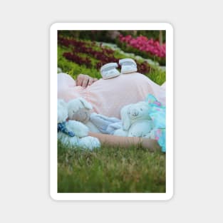 pregnant woman in the park surrounded by stuffed toys Magnet