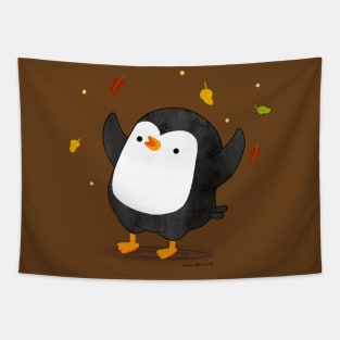 Penguin having fun with autumn leaves Tapestry