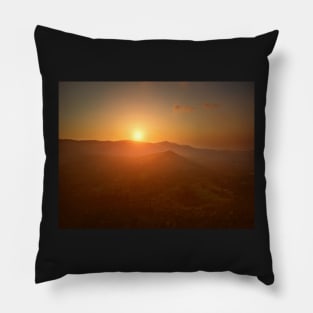 Aerial view of sunset over mountain jungle Pillow