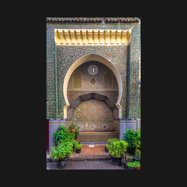 Moroccan fountain in Fes, Morocco by mitzobs