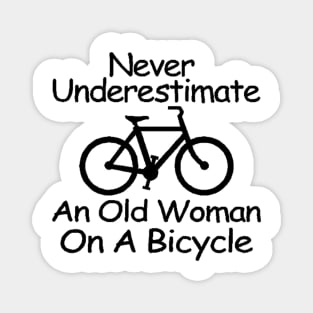 never understimate an old woman on a bicycle black Magnet