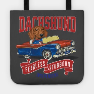 Humor Funny and Cute Doxie Dachshund dog driving a Vintage car with classic red white and blue flags for a retro parade Tote