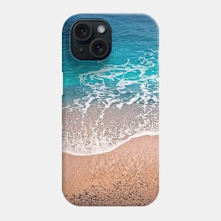 Blue ocean waves hits the shoreline Phone Case