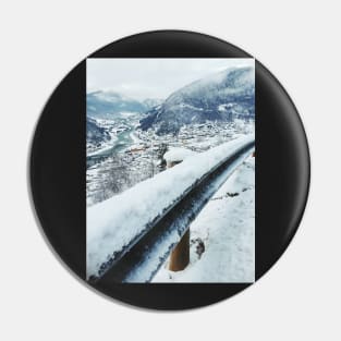 Scandinavian Winter - Fresh-Fallen Snow on Guardrail With White Valley in Background Pin