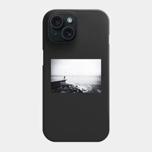 Solitary man at Cromer beach in Norfolk Phone Case