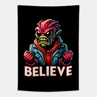 Furious alien monster with the text believe. Funny alien design Tapestry