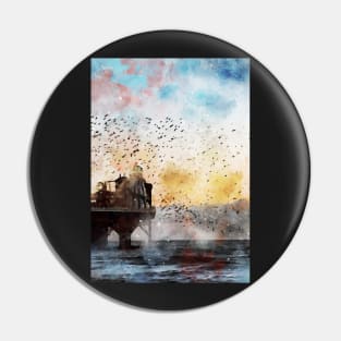 Birds flying around a pier and helter skelter Pin