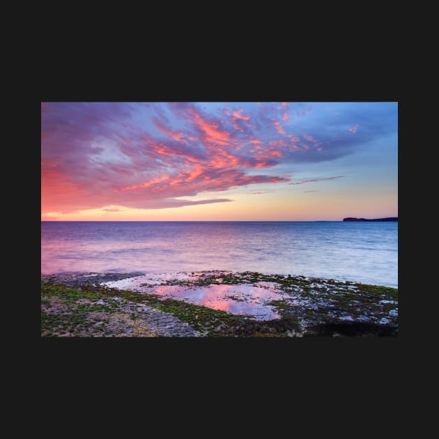 Heart shaped rockpool at sunrise by dags