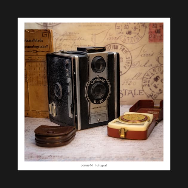 An old vintage camera with external exposure meter, as a poster by connyM-Sweden