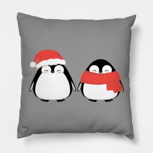 Couple of cute penguins, friends in winter Christmas red hat and scarf. Pillow