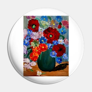 a lovely vibrant bouquet of flowers in a silver vase Pin