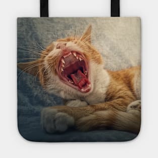 sleepy orange cat yawning Tote