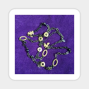 Black and gold chain with Doves on a deep purple background Magnet