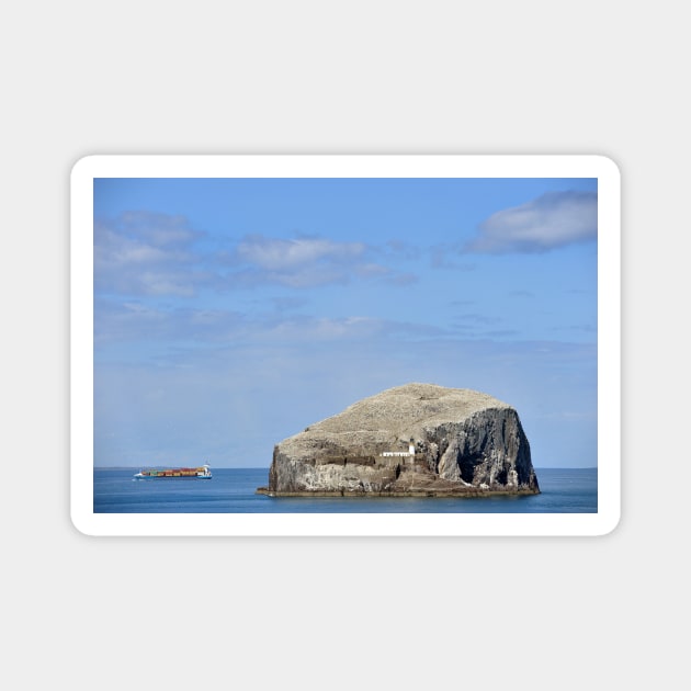 A cargo ship passes Bass Rock, Scotland Magnet by richflintphoto