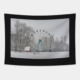 Old observation wheel in the snowy park Tapestry