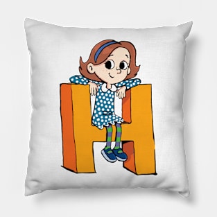 girl is sitting on the capital letter H Pillow