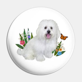 A Bolognese Dog Sitting in Soft Grass with Flowers Pin