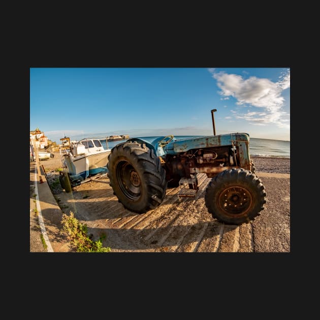 Fisheye view of a tractor, trailer and fishing boat on Cromer Beach on the North Norfolk Coast by yackers1