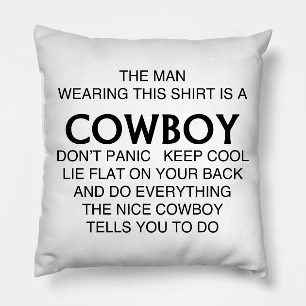 THE MAN WEARING THIS SHIRT IS A COWBOY Pillow by TheCosmicTradingPost