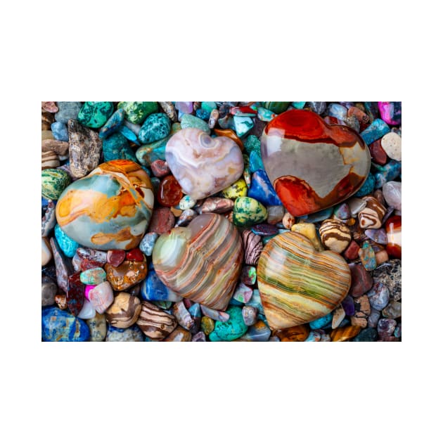 Five Stone Hearts On Pile Of Polished Stones by photogarry