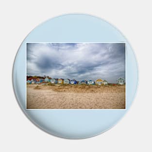 Stormy Skies and Beach Huts at Mudeford Pin