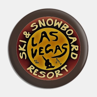 Las Vegas Ski & Snowboard Resort logo in yellow and burnt orange Pin