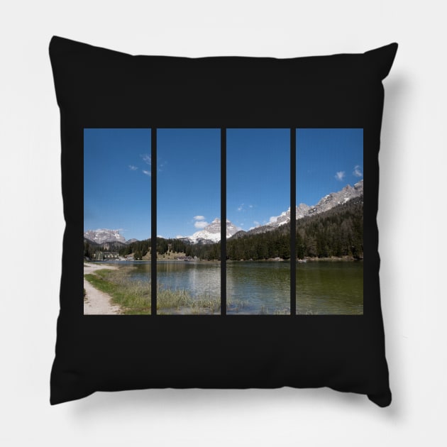 The fabulous alpine lake of Misurina in the Dolomites. Boat on the water. Lovely and relaxing place in the Italian Alps. Reflections in the rippled water. Sunny spring day. Pillow by fabbroni-art