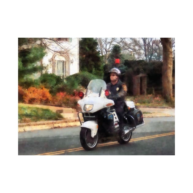 Motorcycle Cop on Patrol by SusanSavad