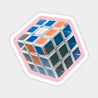Cube is Partially Solved, with Visible Colors Including Blue, White, Orange, and Grey Magnet