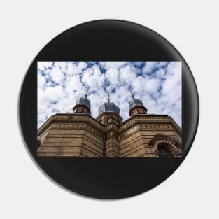 Three domes of Church against cloudy blue sky Pin