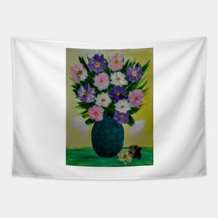 Some abstract flowers in purple and pink in a turquoise and gold vase . Tapestry