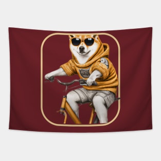 Shiba Inu wearing a hoodie riding a bike and wearing sunglasses Tapestry