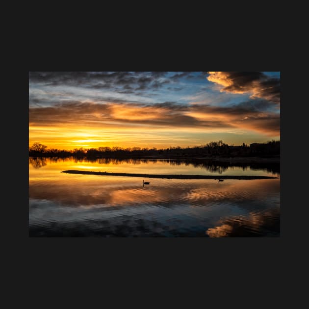 Colorful Sunrise Over A Lake by jecphotography