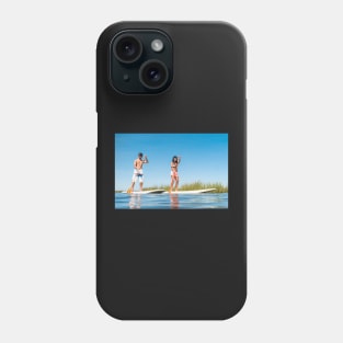 Man and woman stand up paddleboarding Phone Case