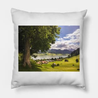 Valley in Switzerland bathing in sunlight Pillow