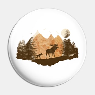 Mother moose and her cub in the mountains at sunset Pin