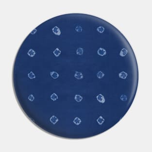 Shibori white dots over blue indigo background Pin