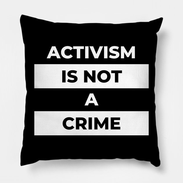 Activism Is Not A Crime (White Print) Pillow by the gulayfather